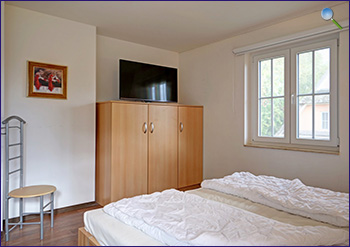 Ein weiteres Schlafzimmer im Dachgeschoss